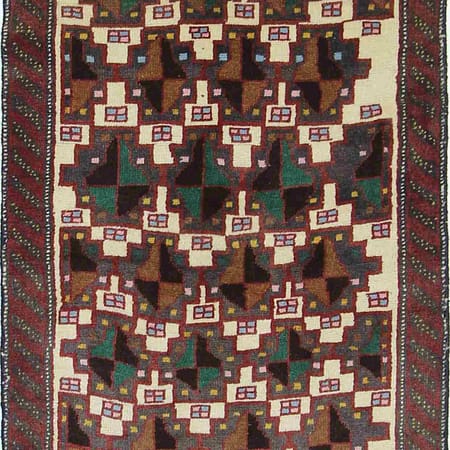 Tapis persan Baluch noué à la main