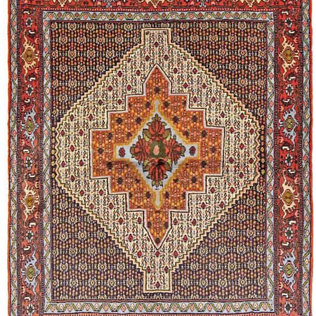 Hand-knotted Persian Senneh carpet